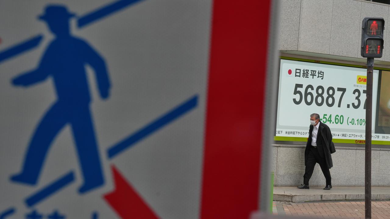 Shares edge up in thinly-traded Asian holiday markets