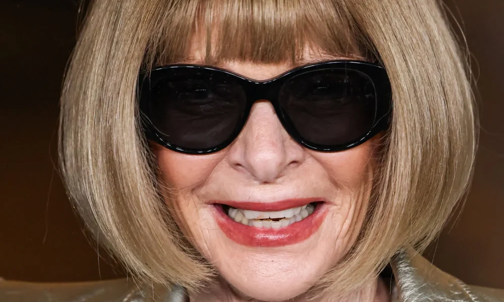 Anna Wintour posing on the red carpet.