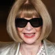 Anna Wintour posing on the red carpet.