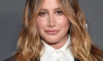 Ashley Tisdale posing on the red carpet.