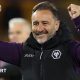 Vitor Pereira holds up his arms and smiles