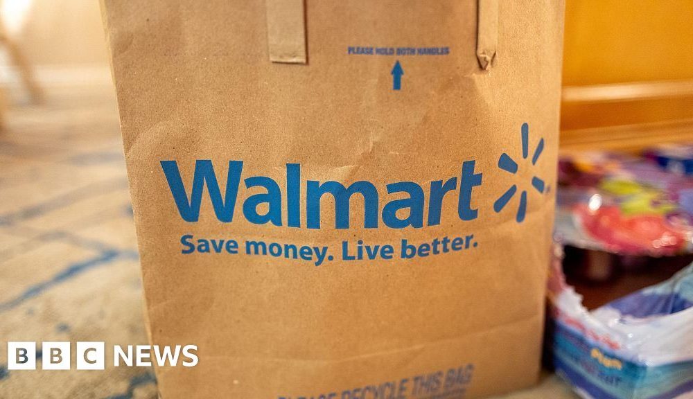 Walmart to pay $100m over claims it misled drivers over pay
