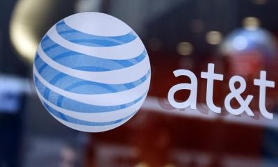 Citing regulatory uncertainty around the classification of broadband Internet, AT&T said Wednesday it will pause capital investments in 100 cities.