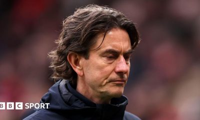 Tottenham boss Thomas Frank looks dejected after defeat by Manchester United