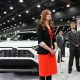 Mallory McMorrow listens to a speaker talk about Toyota vehicles at the Detroit Auto Show on Jan. 14.