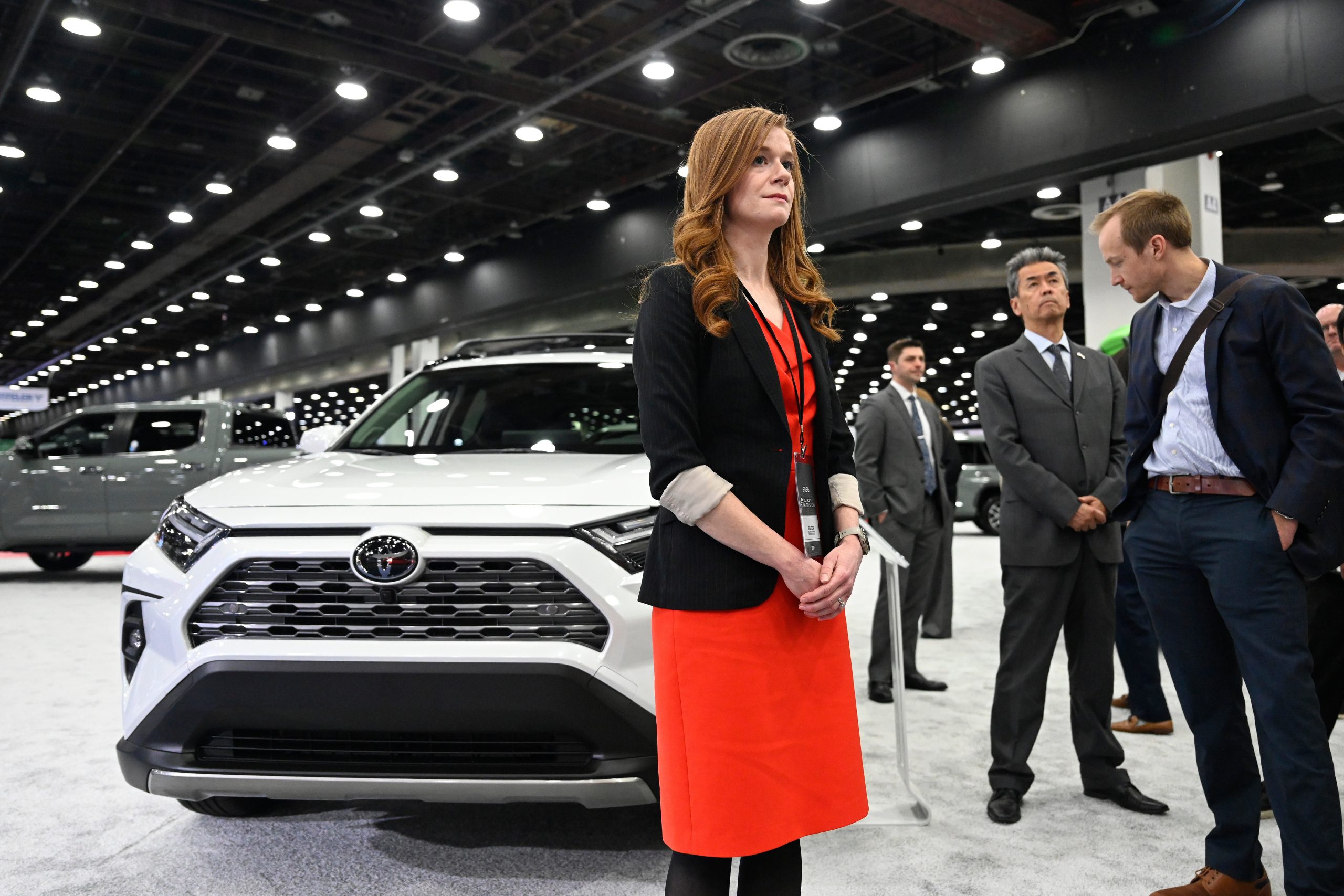 Mallory McMorrow listens to a speaker talk about Toyota vehicles at the Detroit Auto Show on Jan. 14.