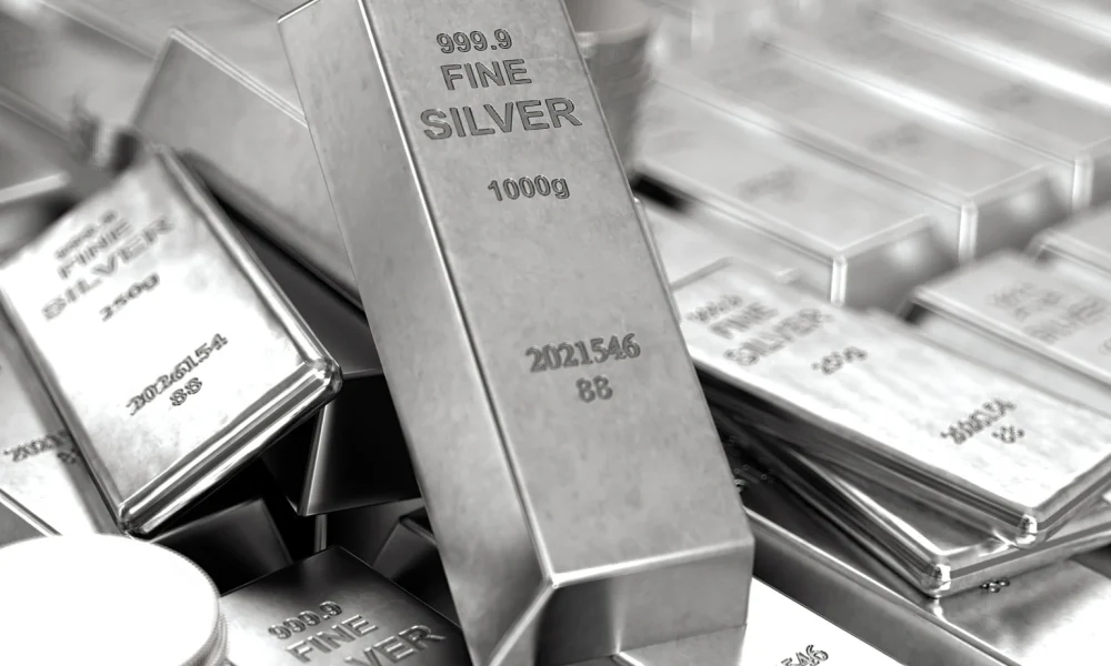 Silver Trades Near $76 After Wide Holiday Swing As Firmer Dollar Caps Gains