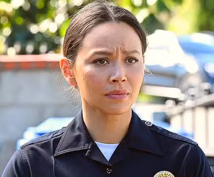 Lucy Chen looking serious and in her uniform in The Rookie