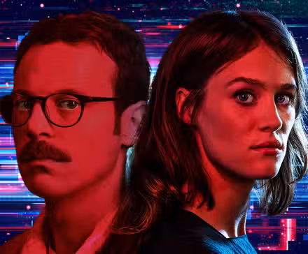 Halt and Catch Fire's Scott McNairy and Mackenzie Davis against a staticky TV screen