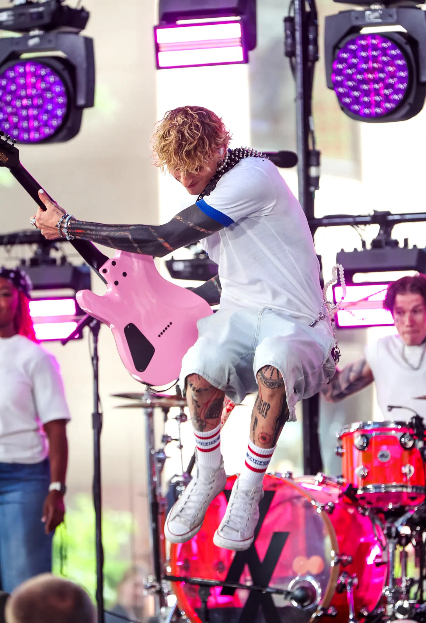 Machine Gun Kelly leaps into the air as he performs at the Today Show Citi Concert Series in New York City