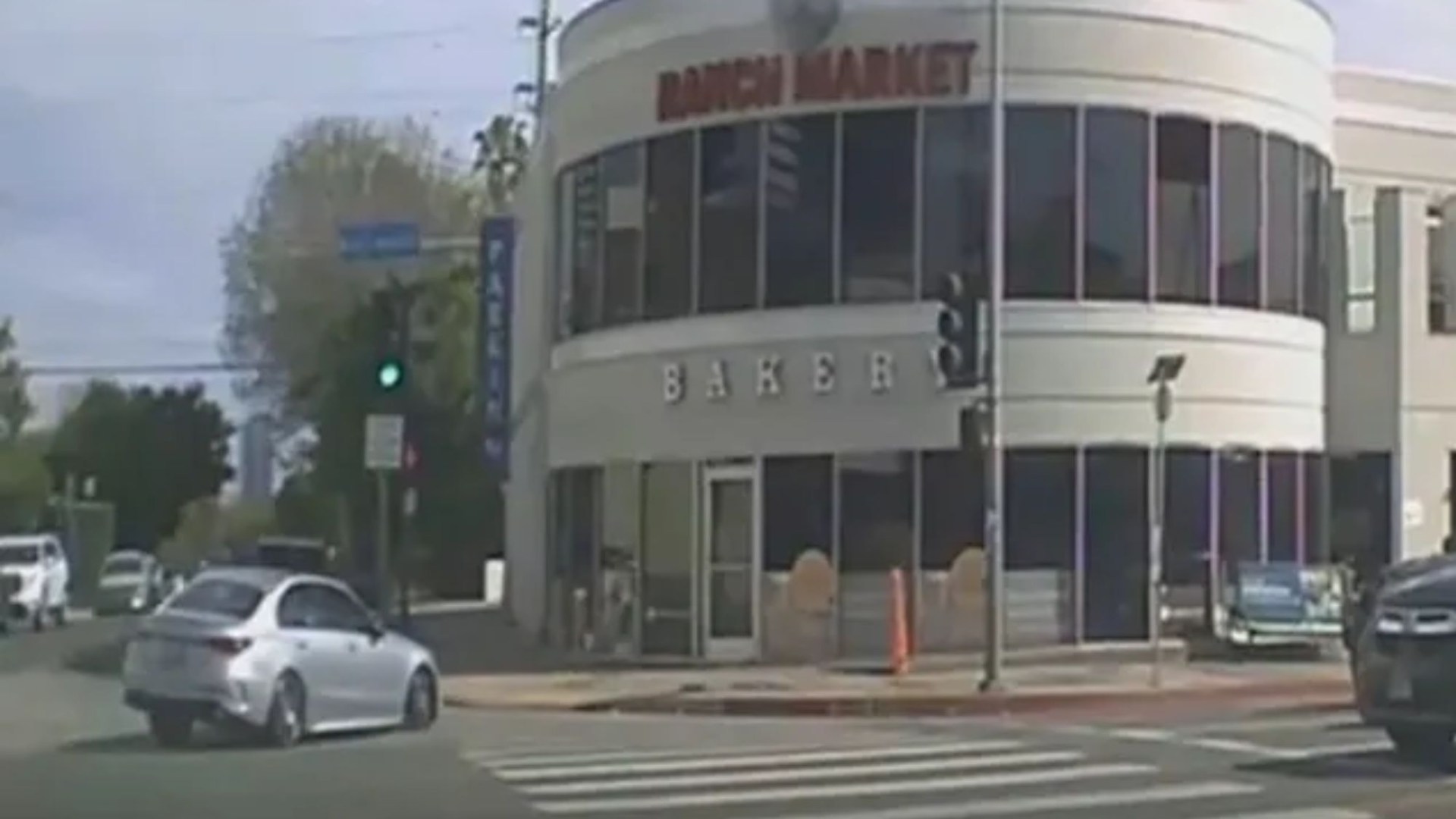 Horror moment car ploughs into shop killing three after driver, 92, hit cyclist and lost control of wheel in Los Angeles