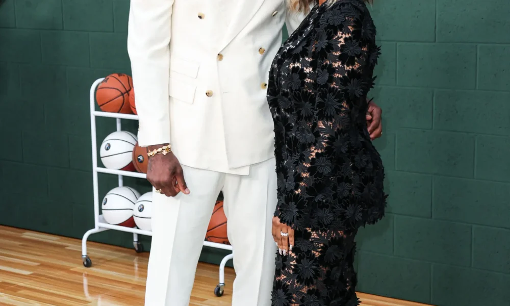 LeBron and Savannah James posing on the red carpet.