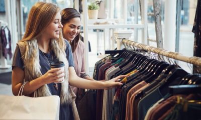 Shop price inflation remained subdued in February, confounding forecasts of a dramatic rise, as heavy discounting at fashion and non-food retailers helped keep prices in check.