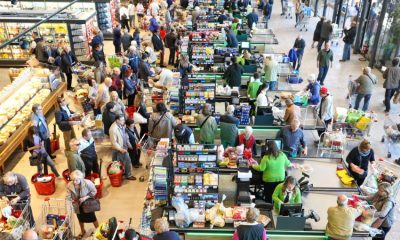 Supermarket executives are being questioned by MPs over why food prices are still rising as some wholesale costs are falling.