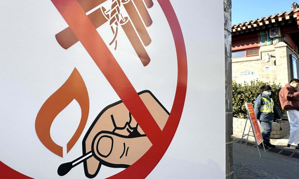 A notice calling for a ban on fireworks in Beijing. Pic: AP