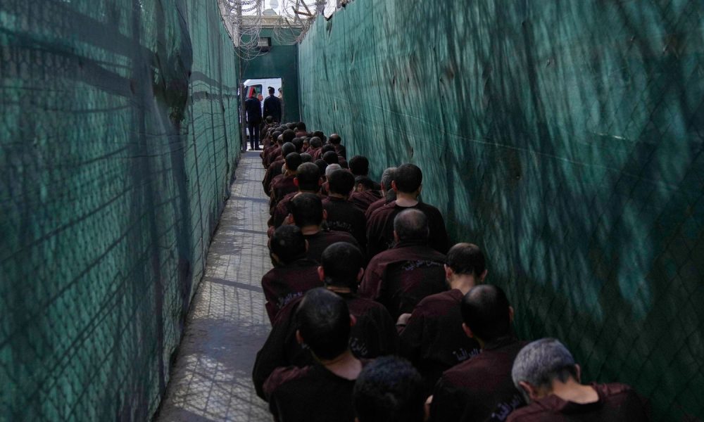 Suspected Islamic State militants at Al-Karkh Central Prison in Baghdad after being transferred there from Syria. Pic: AP