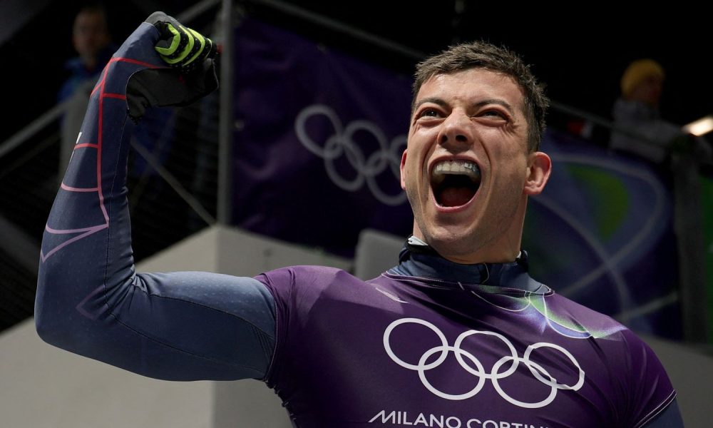 Matt Weston celebrates after his second-run in the skeleton heats. Pic: Reuters