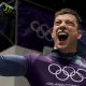 Matt Weston celebrates after his second-run in the skeleton heats. Pic: Reuters