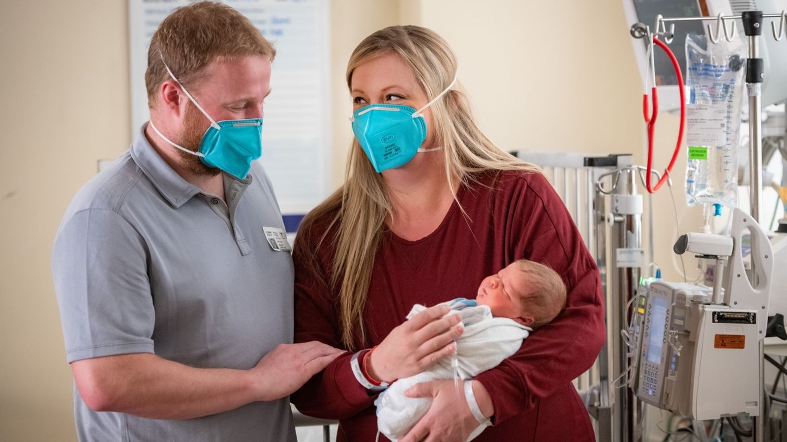Tobi with parents Jeff Maginnis and Michelle Johnson