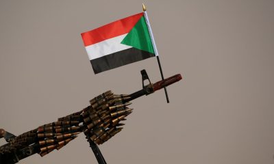 A Sudanese flag attached to the machine gun of Paramilitary Rapid Support Forces (RSF) soldiers. Pic: Reuters