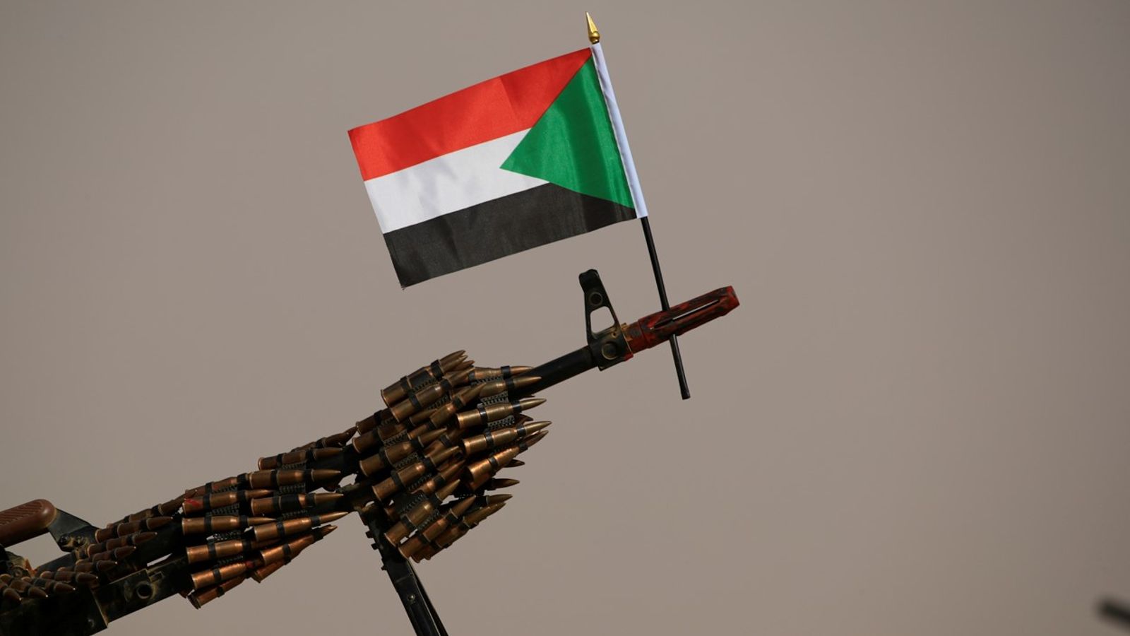 A Sudanese flag attached to the machine gun of Paramilitary Rapid Support Forces (RSF) soldiers. Pic: Reuters