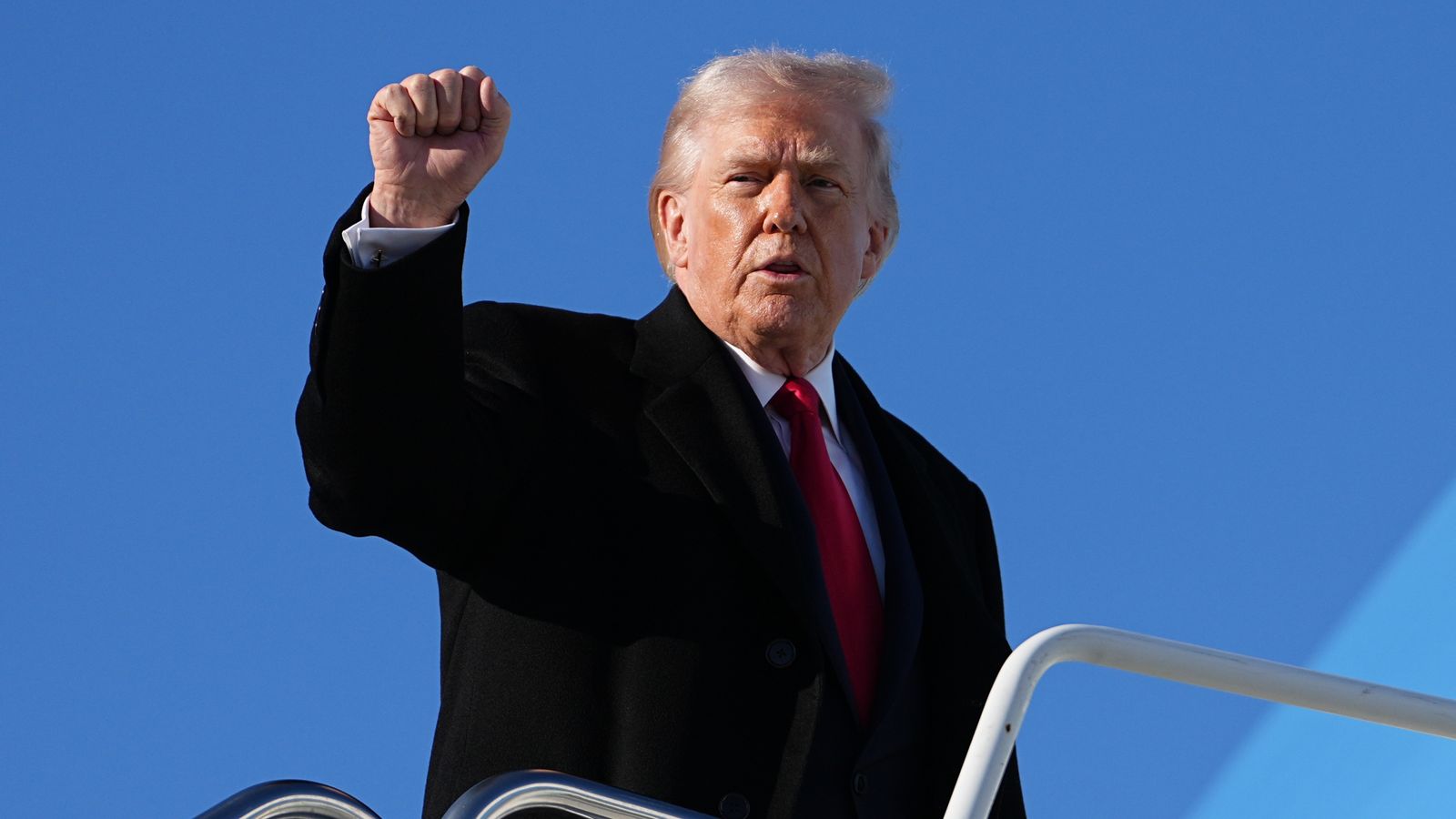 Donald Trump boarding Air Force One at Pope Army Airfield in Fort Bragg. Pic: AP