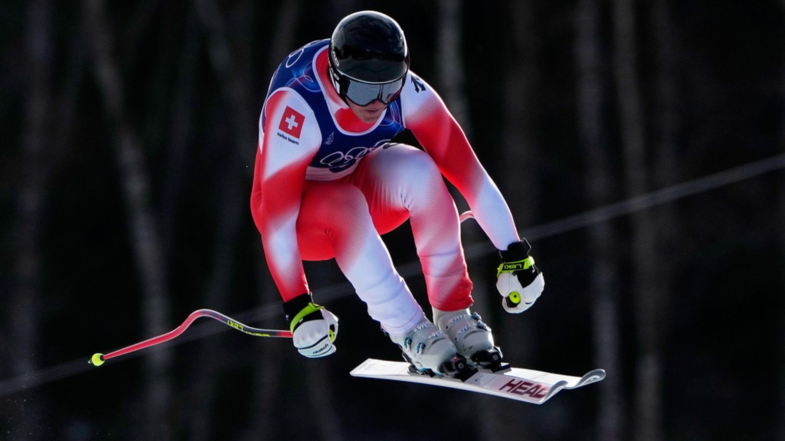 Switzerland's Franjo von Allmen speeds down the course on the first day of the Winter Olympics. Pic: AP