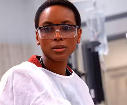 Tracy Ifeachor with her goggles and protective gear on in The Pitt.