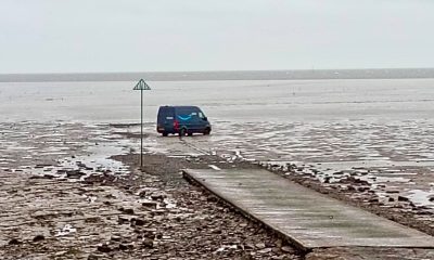 Amazon delivery driver rescued after GPS sends van onto UK mudflats