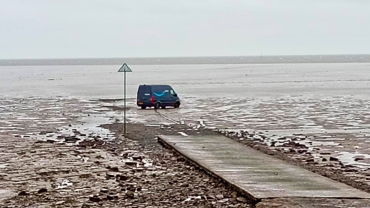Amazon delivery driver rescued after GPS sends van onto UK mudflats