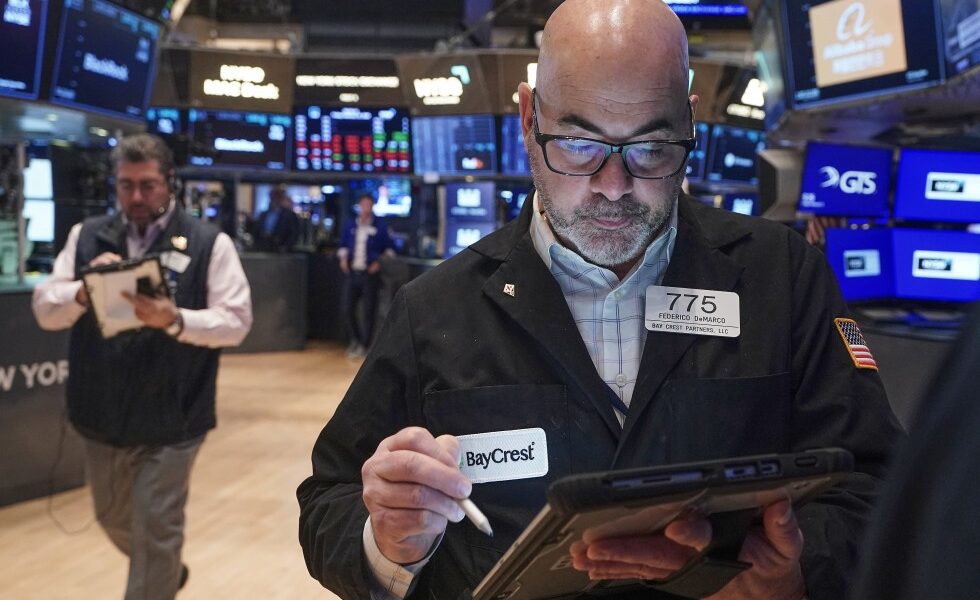 World shares mostly advance and gold declines