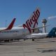 Virgin's profit dented by post-administration tax bill