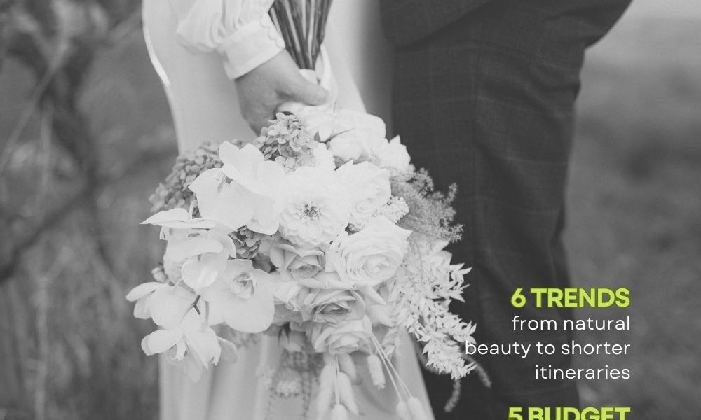 Bride holding flowers with groom
