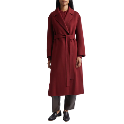 Black woman wears red winter coat that hits below her knees