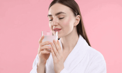woman drinking hydrolized collagen powder