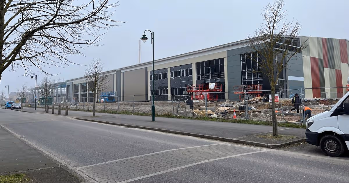 Locals say homes ‘rattle’ as ‘massive eyesore’ warehouses are being built next door
