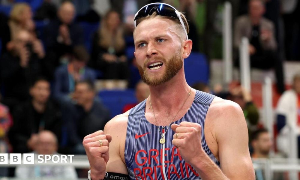 Josh Kerr celebrates winning world indoor 3,000m gold