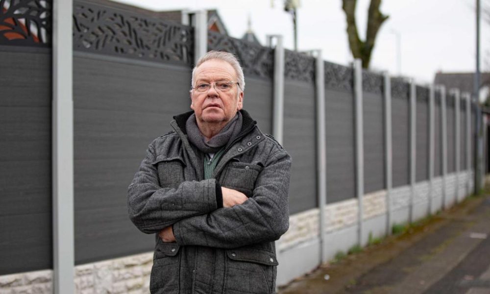 Over Hulton couple speak out after having to rip down £4k fence