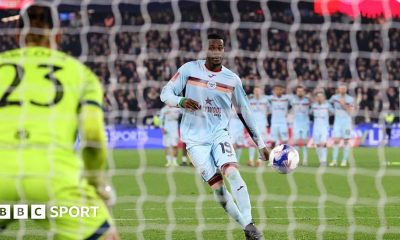 Italy's Andrea Pirlo dinks a penalty down the middle past England goalkeeper Joe Hart at Euro 2012