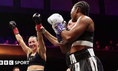 Jade Jones' arm is lifted as the winner of the boxing bout against Egypt Criss