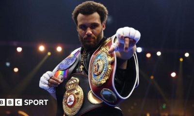 Derek Chisora and Deontay Wilder face off at a news conference draped in the flags of their country