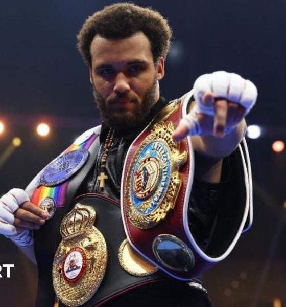 Derek Chisora and Deontay Wilder face off at a news conference draped in the flags of their country