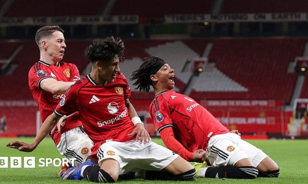 JJ Gabriel (centre) celebrates Junior Brown's (right) match winner with Jay McEvoy for Manchester United in the FA Youth Cup at Old Trafford
