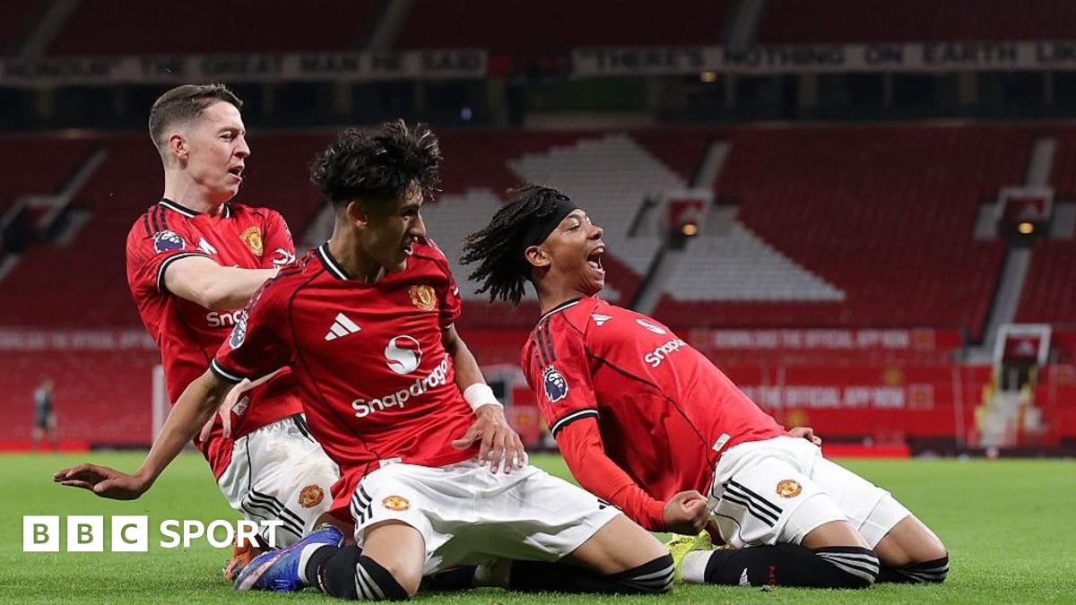 JJ Gabriel (centre) celebrates Junior Brown's (right) match winner with Jay McEvoy for Manchester United in the FA Youth Cup at Old Trafford
