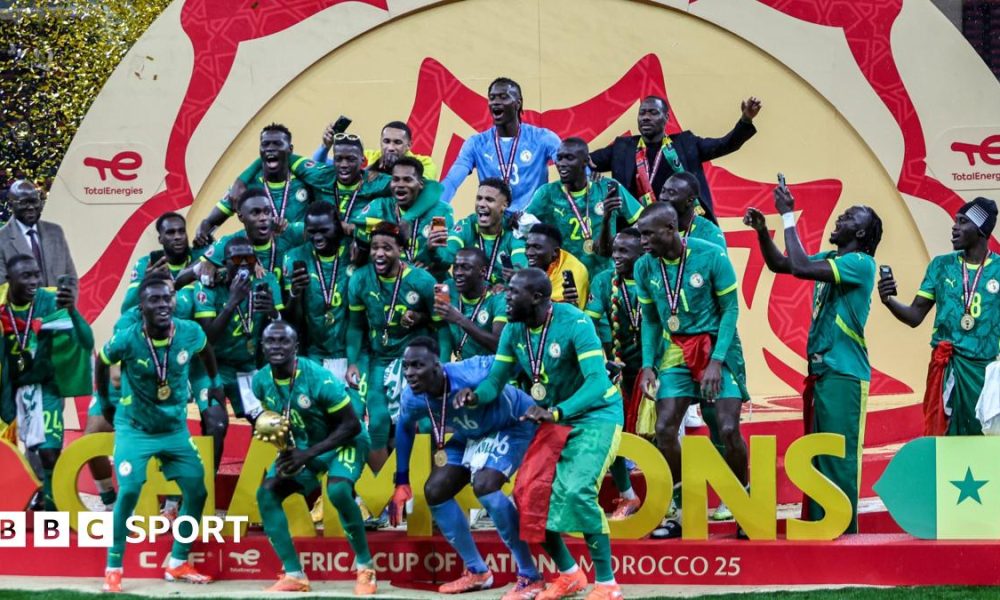 A graphic of Premier League players from every team in the division in 2025-26 season, with the Premier League trophy in front of them.