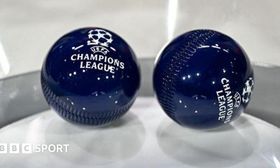 This photograph shows the draw balls bearing the Champions League logo