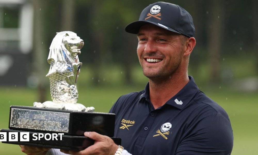 Bryson DeChambeau holds the LIV Golf Singapore trophy