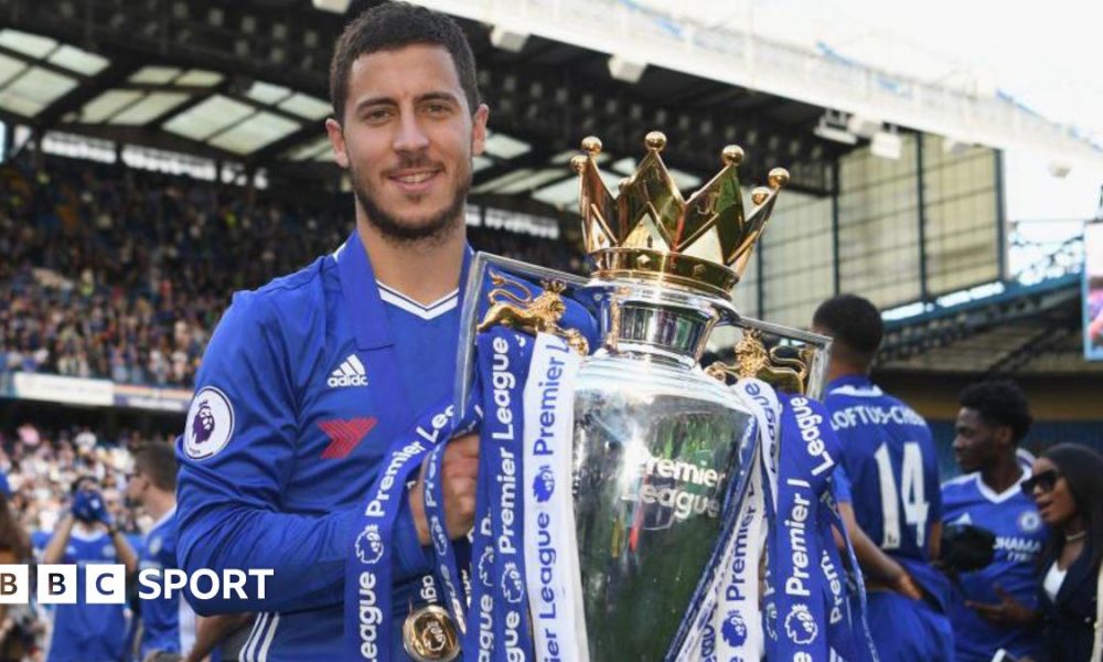 Eden Hazard of Chelsea poses with the Premier League trophy