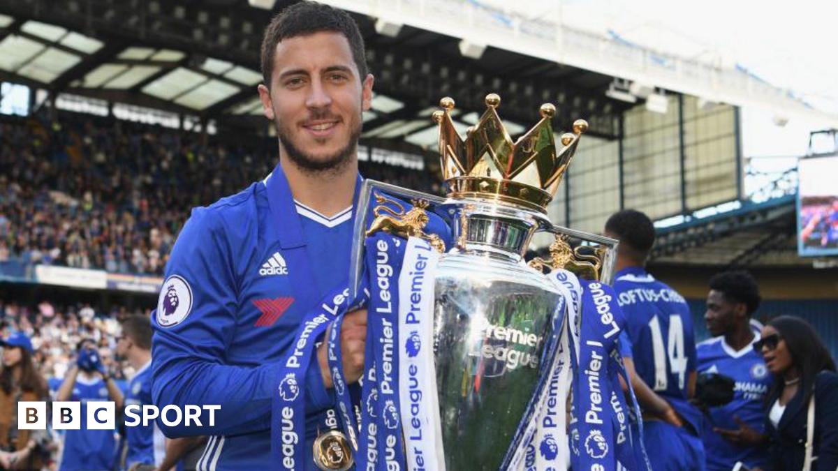Eden Hazard of Chelsea poses with the Premier League trophy
