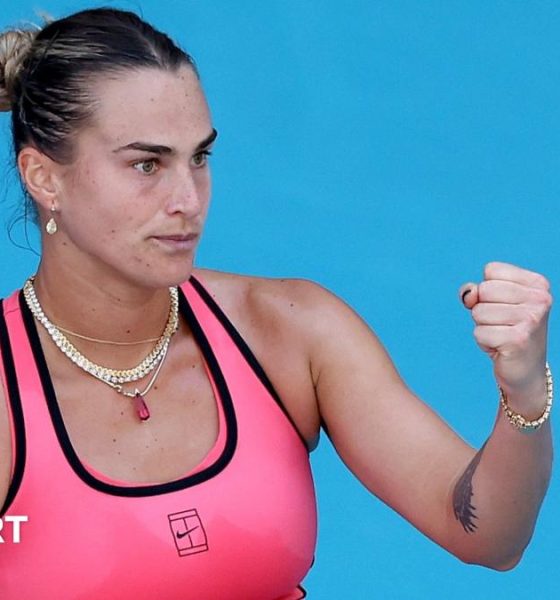 Aryna Sabalenka celebrates winning a point with a clenched fist
